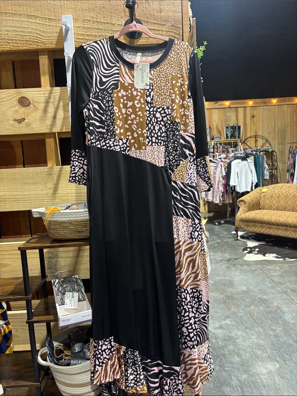 New from my online boutique.. mixed animal empire dress!